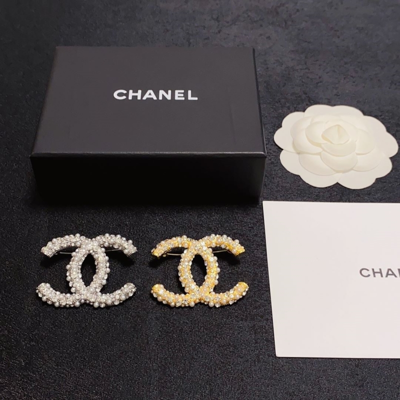 Ch**el brooches